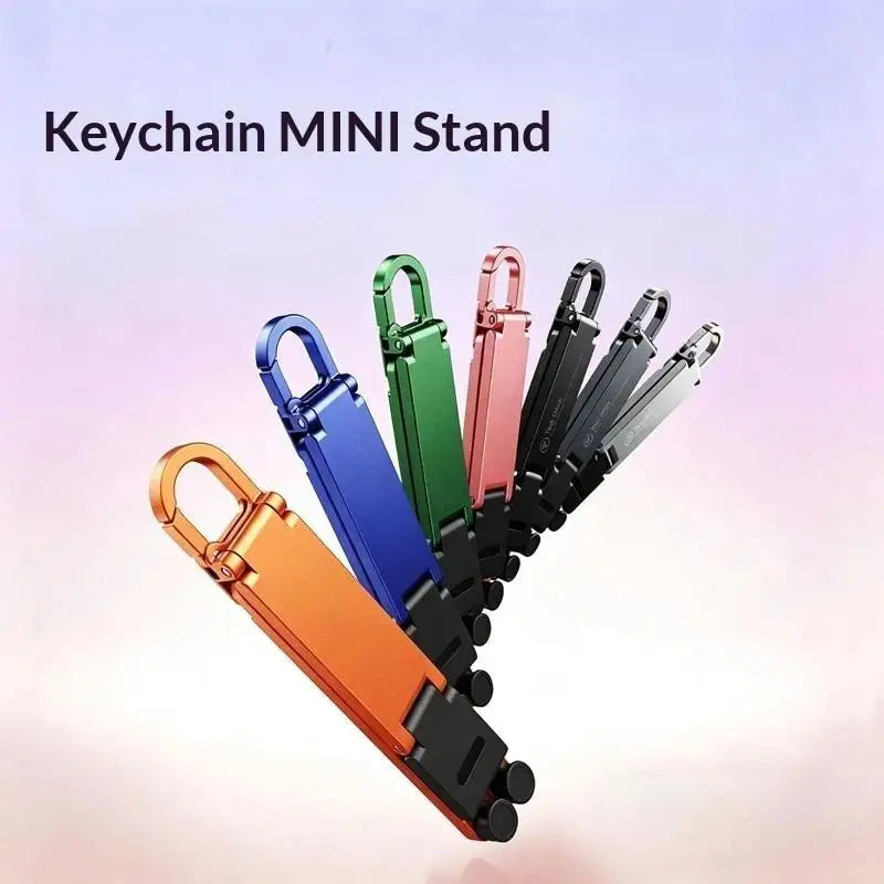 (.) Mini Foldable Keychain Phone Stand Multi-Angle Adjustable Lightweight Hands-Free Cell Phone Holder For Travel Desk