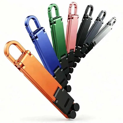 (.) Mini Foldable Keychain Phone Stand Multi-Angle Adjustable Lightweight Hands-Free Cell Phone Holder For Travel Desk
