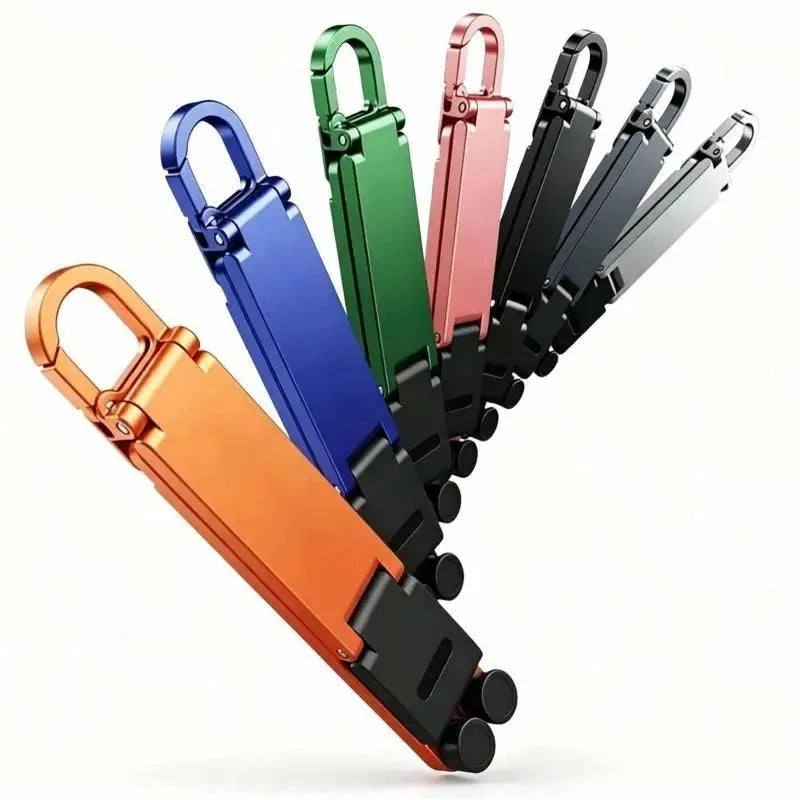 (.) Mini Foldable Keychain Phone Stand Multi-Angle Adjustable Lightweight Hands-Free Cell Phone Holder For Travel Desk